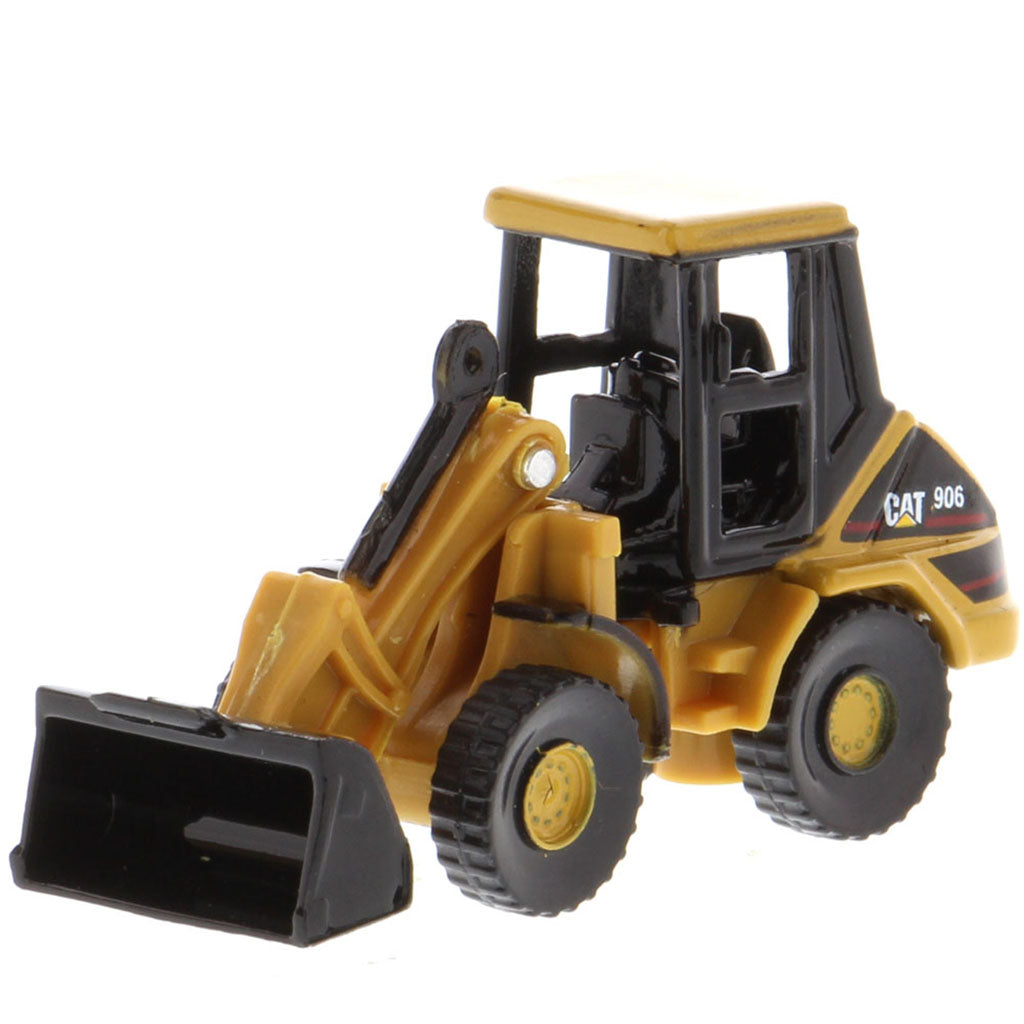 A miniature yellow and black toy CAT 906 front loader, shown from a three-quarter angle against a plain white background.