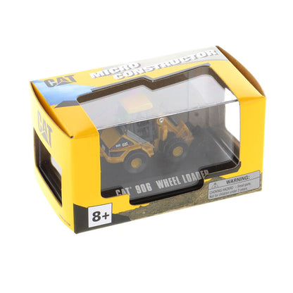 CAT Micro Constructor toy set packaging box, featuring yellow and blue graphics with a construction vehicle inside, photographed on a white background.