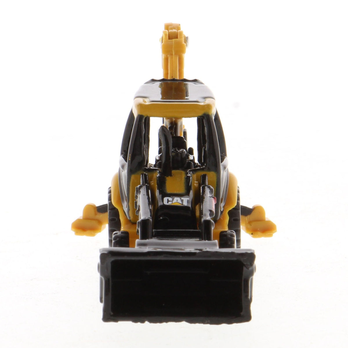 A small yellow and black toy caterpillar backhoe loader with a front loader bucket and rear excavating arm, photographed on a plain white background.