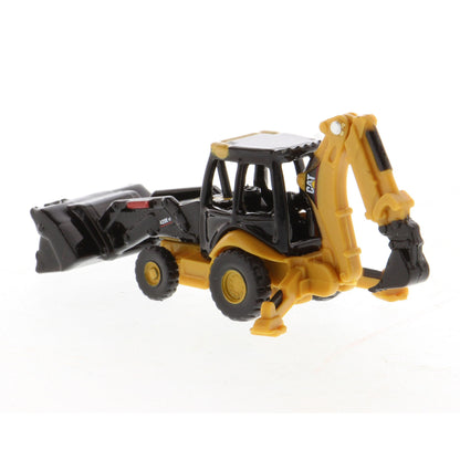 A small yellow and black toy caterpillar backhoe loader with a front loader bucket and rear excavating arm, photographed on a plain white background.