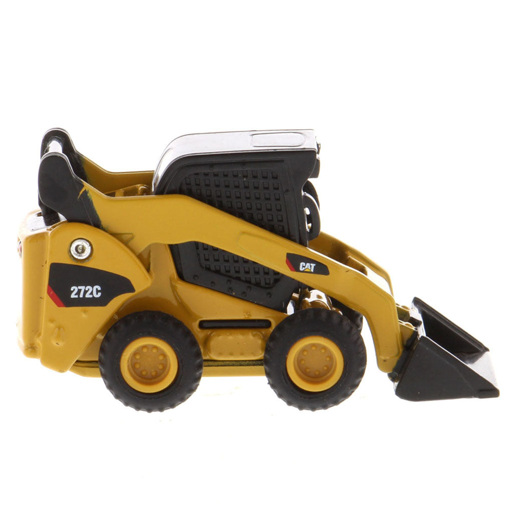 Mini Model of a Cat Yellow Caterpillar 272C Skid Steer Loader on a White Background