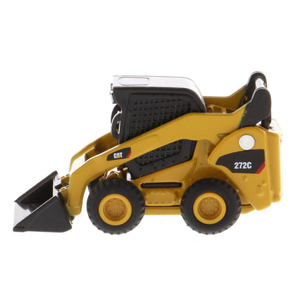 Mini Model of a Cat Yellow Caterpillar 272C Skid Steer Loader on a White Background