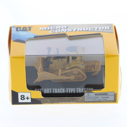 Mini Model of a CAT Yellow Caterpillar D8T Track-Type Dozer with Rear Ripper on a Black Base Plate and CAT Micro Constructor Packaging on a White Background