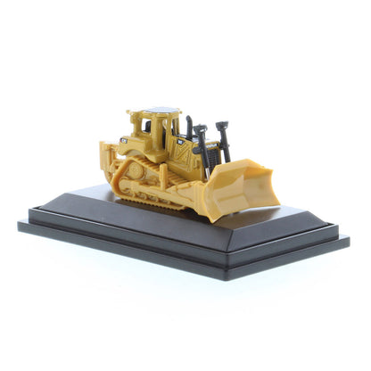 Mini Model of a CAT Yellow Caterpillar D8T Track-Type Dozer with Rear Ripper on a Black Base Plate on a White Background