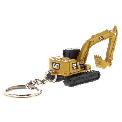 Caterpillar 320 Hydraulic Excavator Keychain on a white background