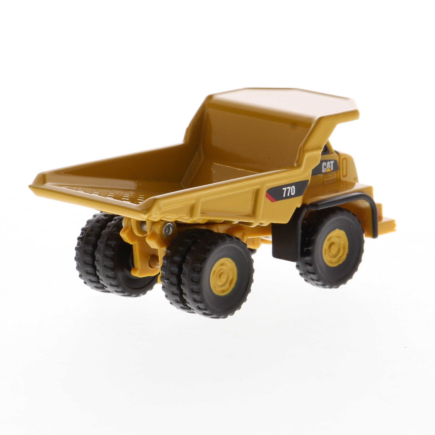 Mini Model of a Caterpillar 770 Off-Highway Haul Truck on a White Background