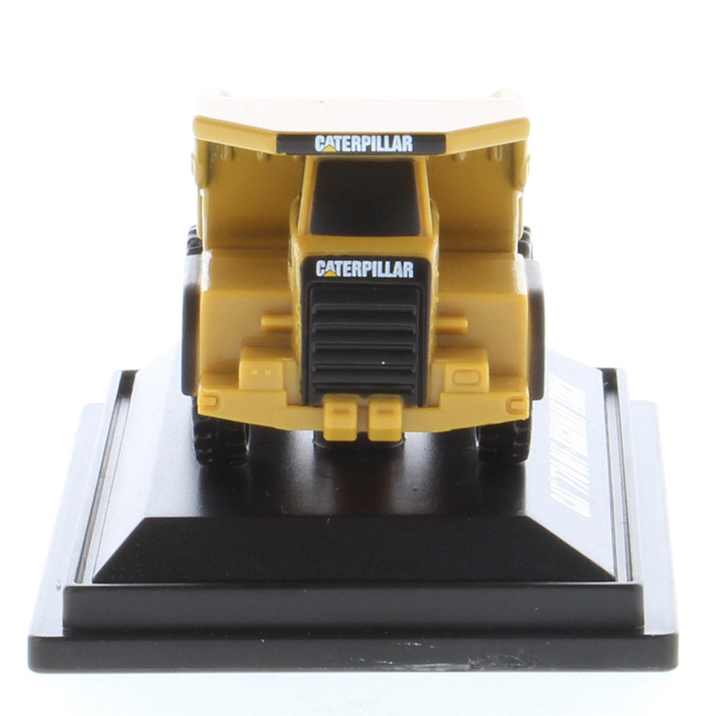 Mini Model of a Caterpillar 770 Off-Highway Haul Truck on a Black Display Base on a White Background