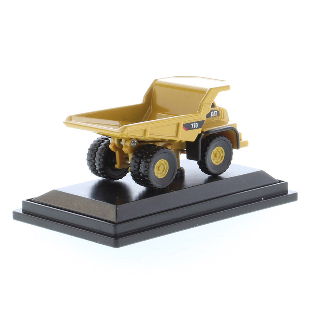 Mini Model of a Caterpillar 770 Off-Highway Haul Truck on a Black Display Base on a White Background