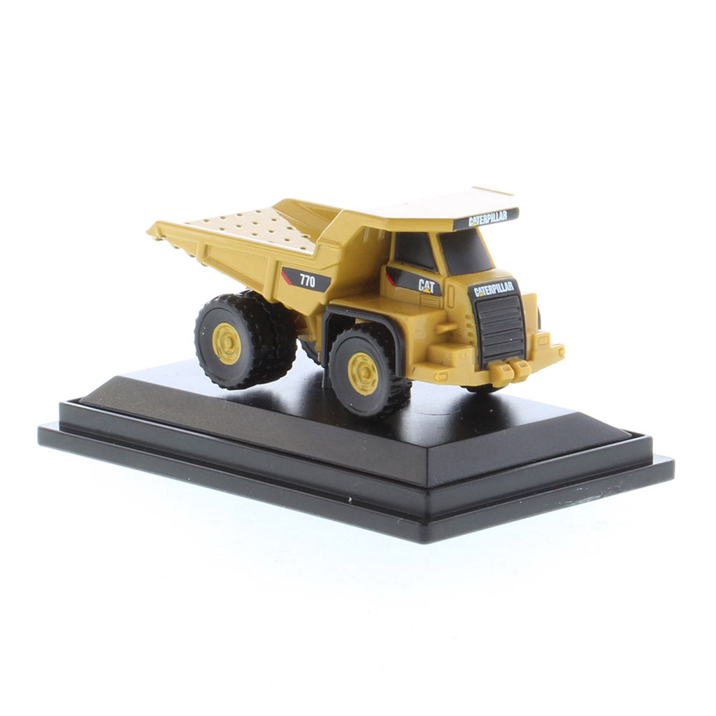 Mini Model of a Caterpillar 770 Off-Highway Haul Truck on a Black Display Base on a White Background