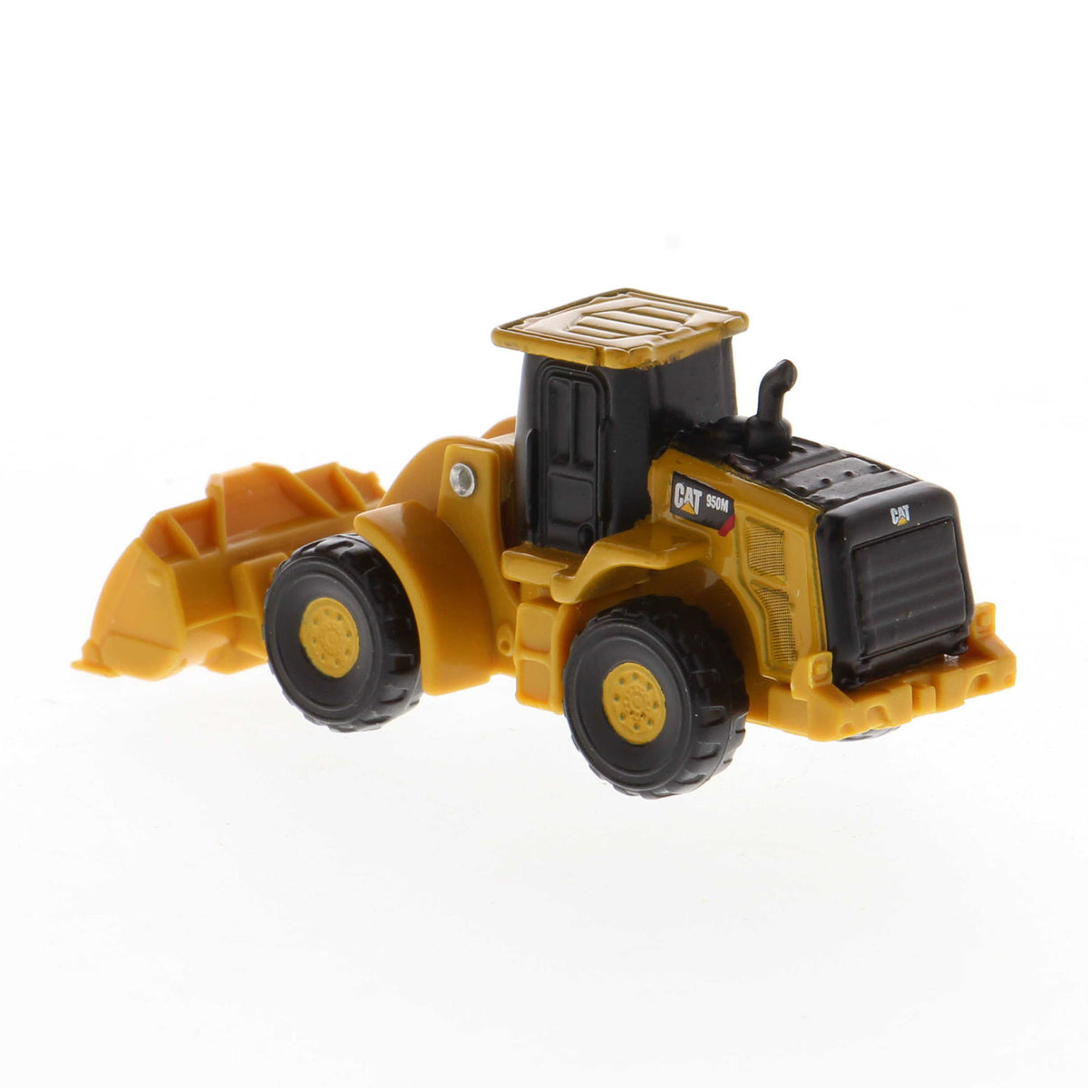Mini Model of a Cat 950M Wheel Loader on a White background