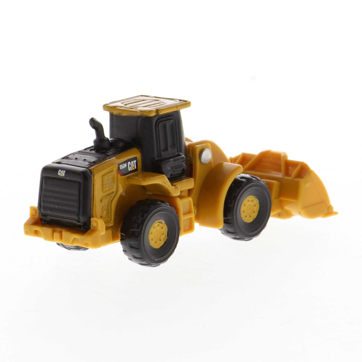 Mini Model of a Cat 950M Wheel Loader on a White background