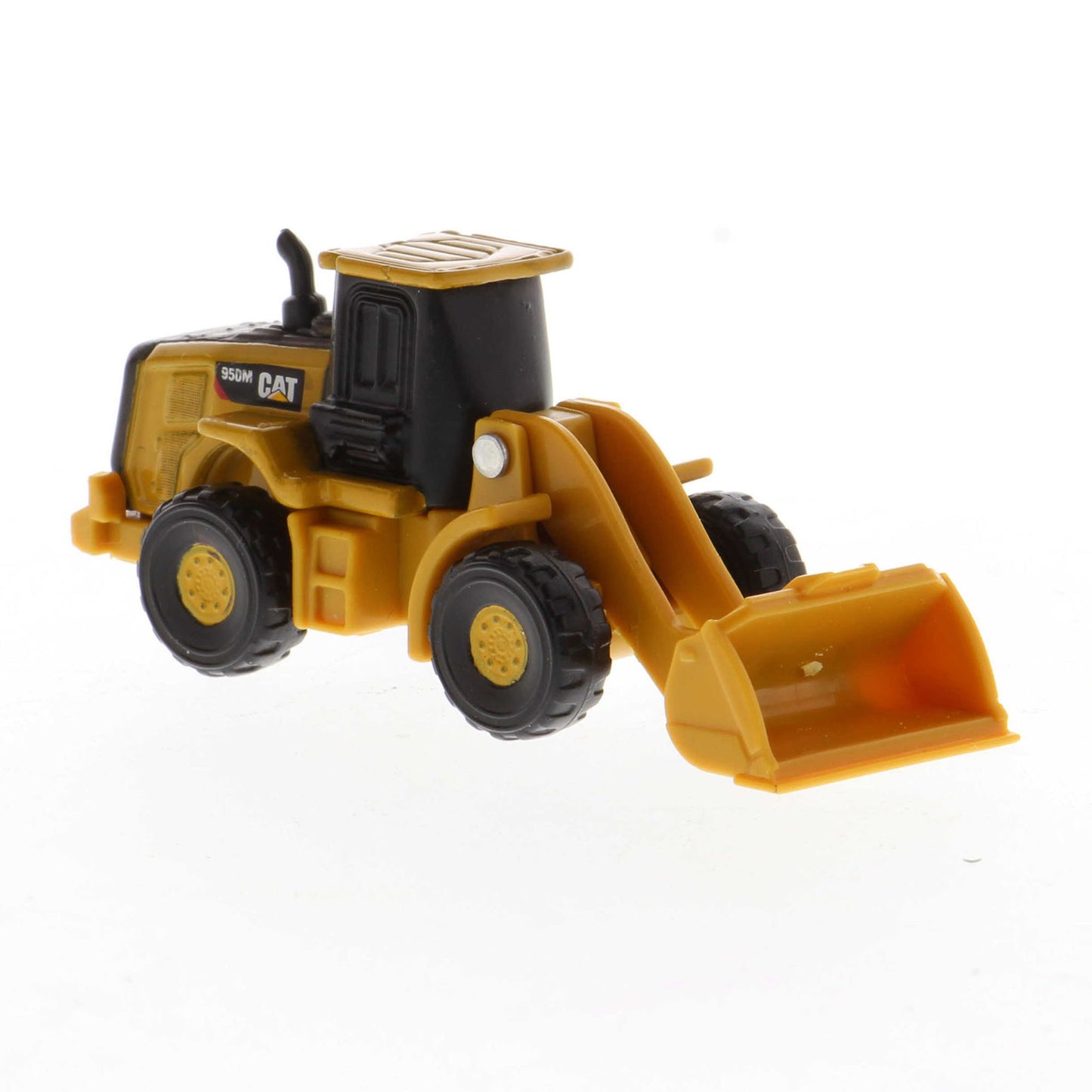 Mini Model of a Cat 950M Wheel Loader on a White background