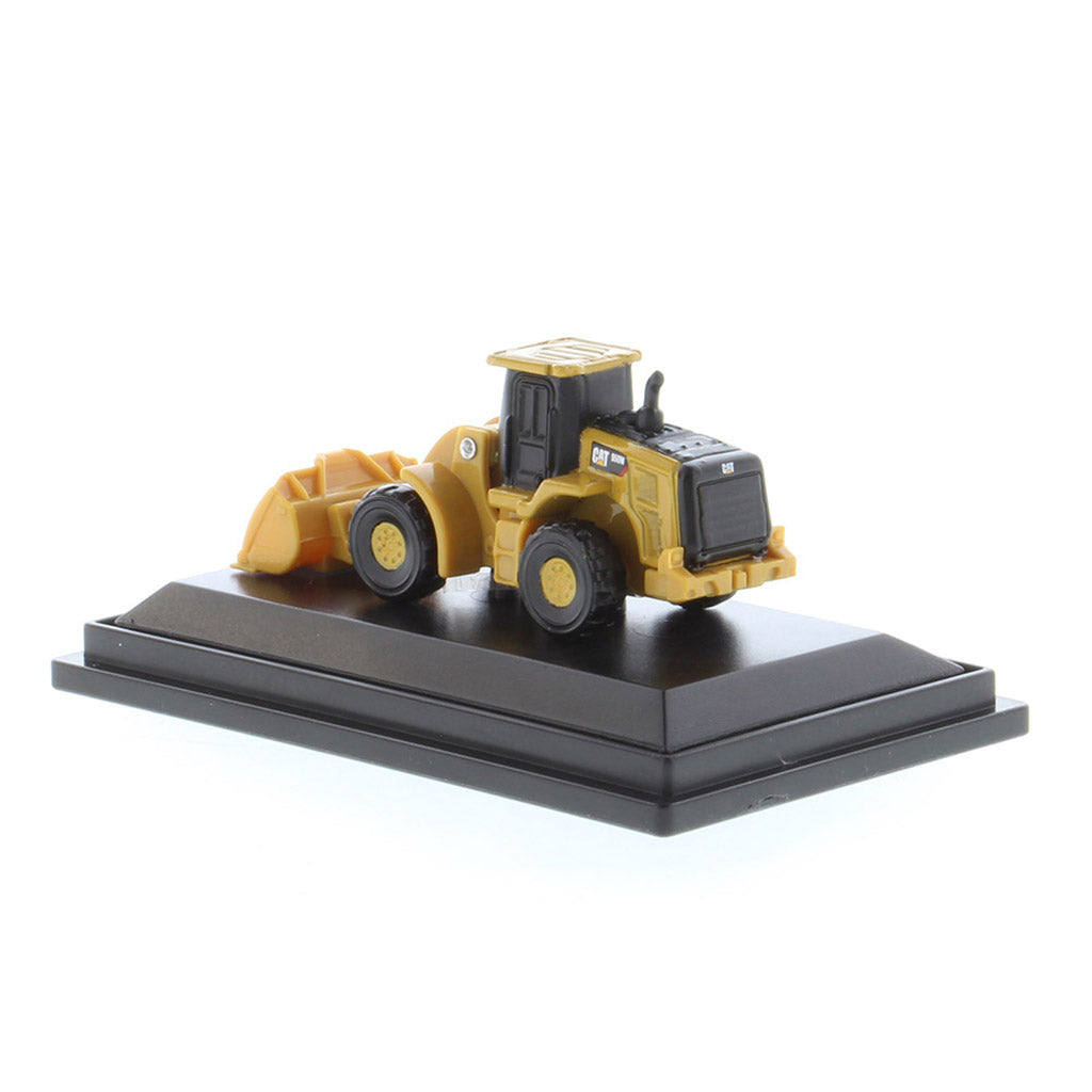 Mini Model of a Cat 950M Wheel Loader Mounted on a Black Display Base on a White background