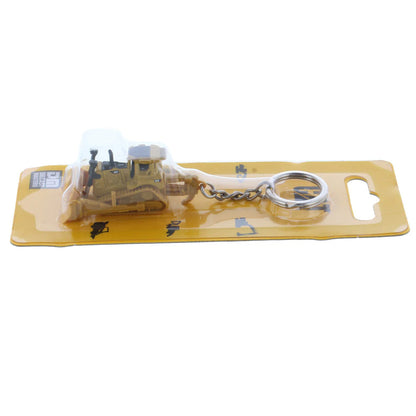 Keychain with bulldozer design on a clear plastic card
