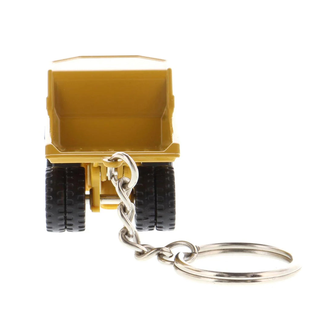 Caterpillar 770 Off-Highway Dump Truck Keychain on a White Background
