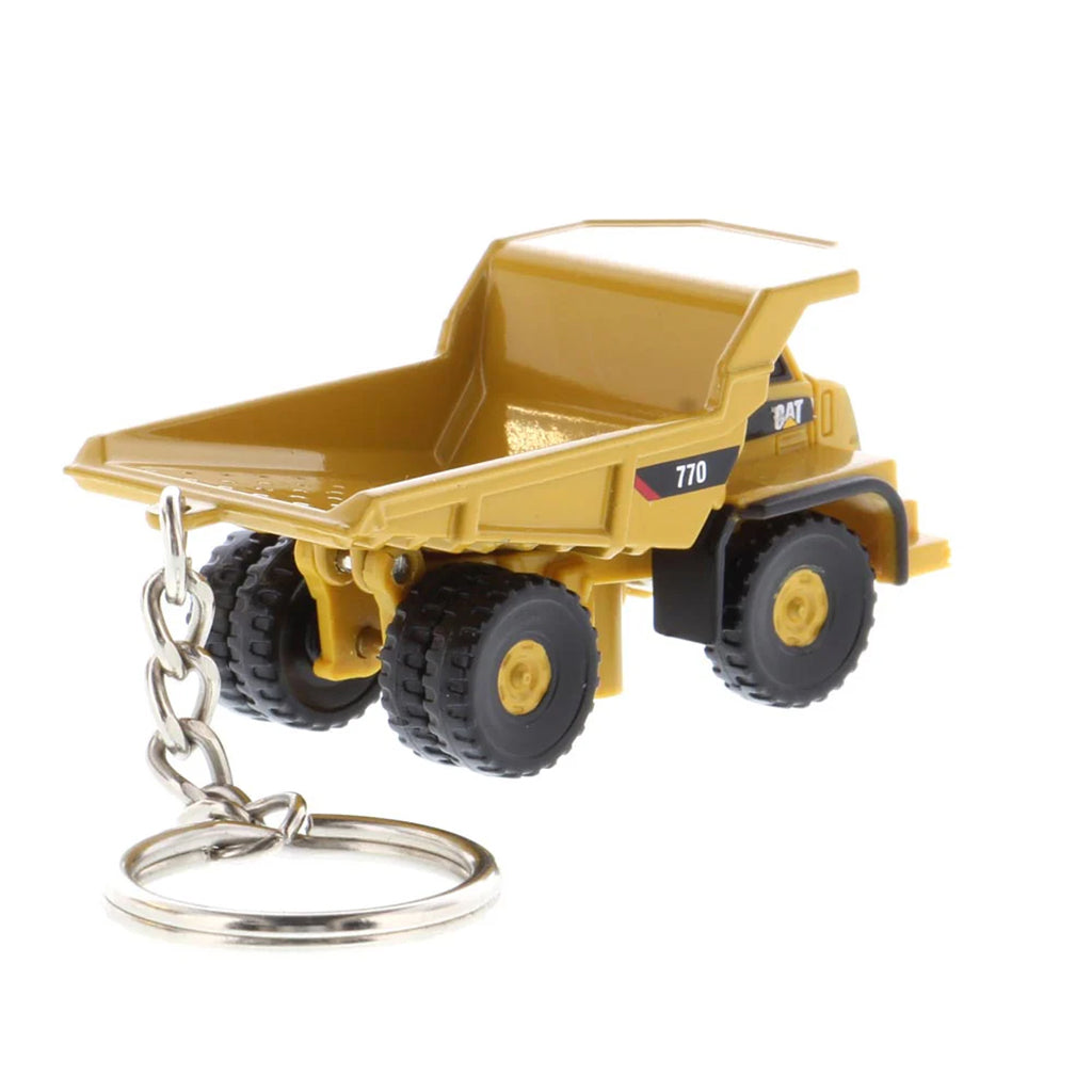 Caterpillar 770 Off-Highway Dump Truck Keychain on a White Background