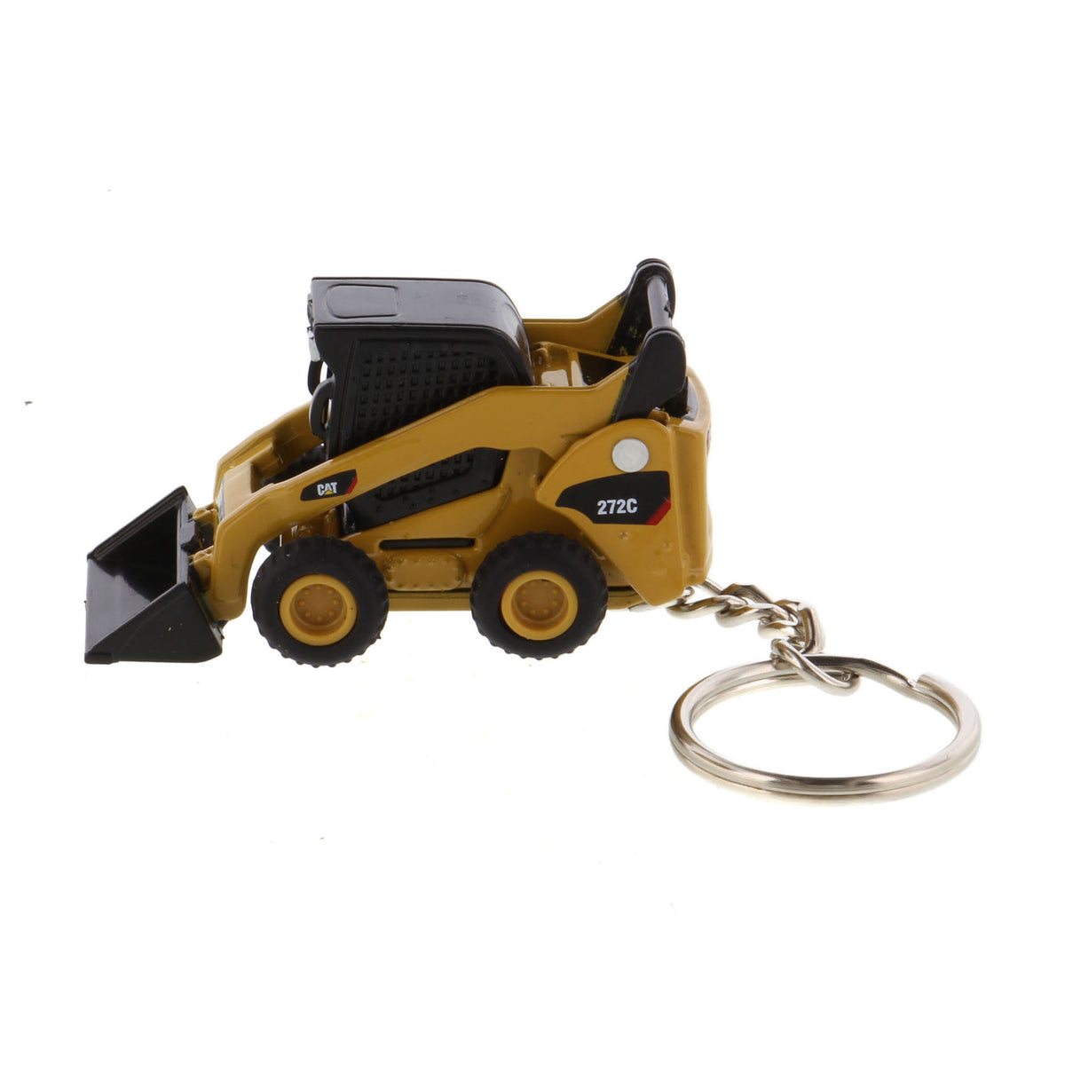 A miniature yellow and black toy skid steer keychain with a metal split ring, shown on a plain white background.