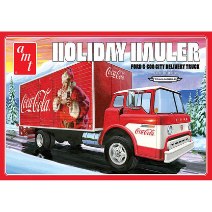 Model kit box for a Coca-Cola holiday-themed truck with Santa Claus on a snowy background.