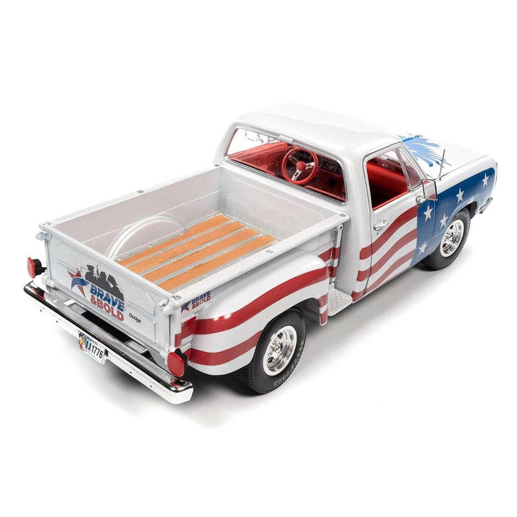 Model truck with American flag design on a white background