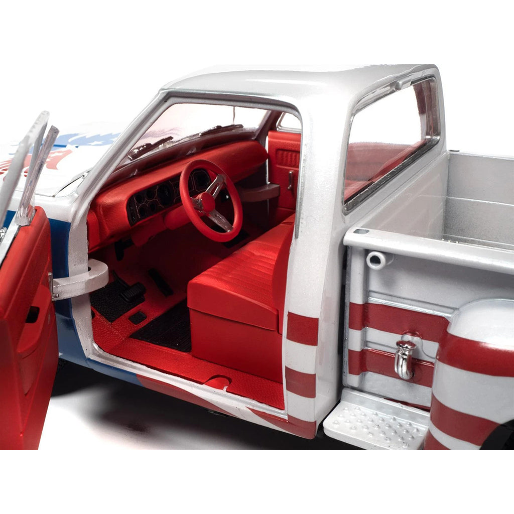 Model truck with open doors showing interior details on a white background