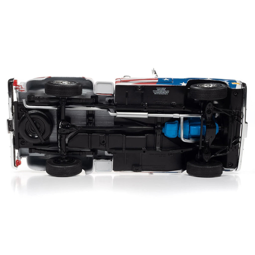 Model car with open hood on a white background