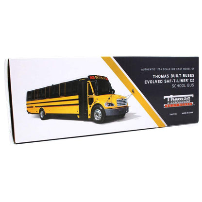 Model of a Thomas Built Buses school bus on packaging with branding details.