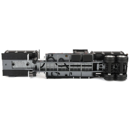Black mechanical component on a white background