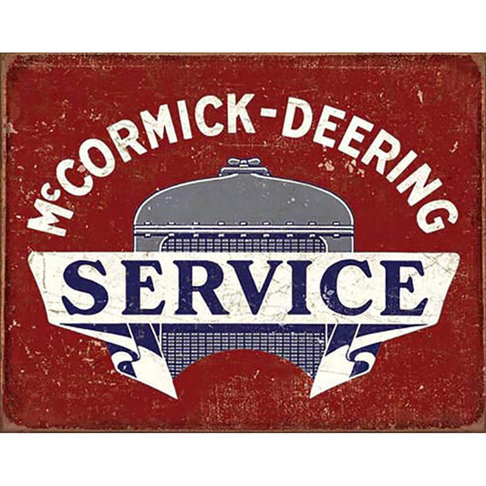 Vintage-style sign with 'McCormick-Deering Service' text and logo on a red background