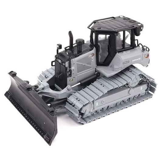 Model of a bulldozer with a large blade on a white background