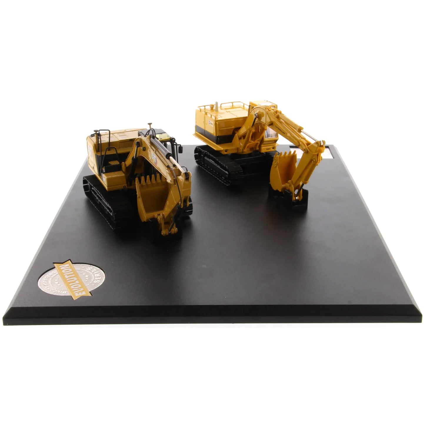 Two toy excavators on a black display stand with a white background