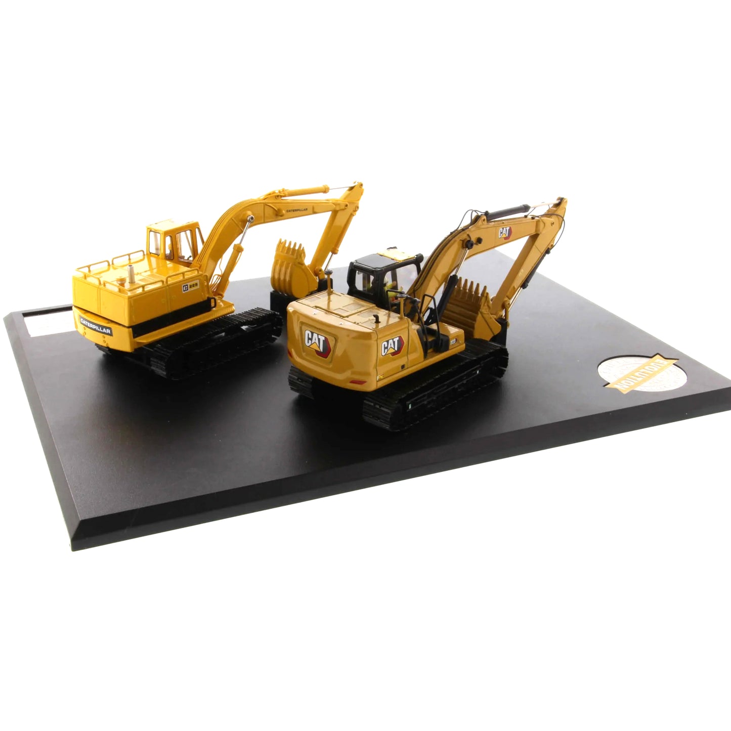 Two yellow excavator models on a black display stand with a white background
