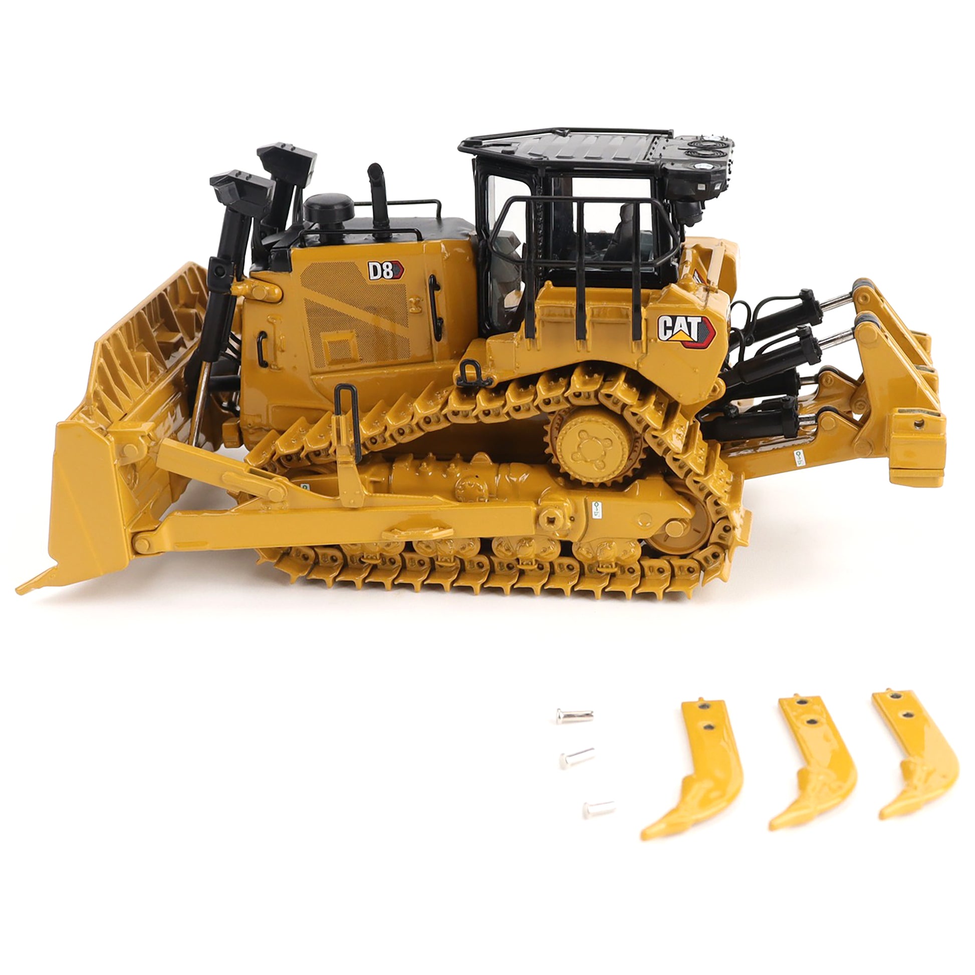 Toy bulldozer with attachments on a white background