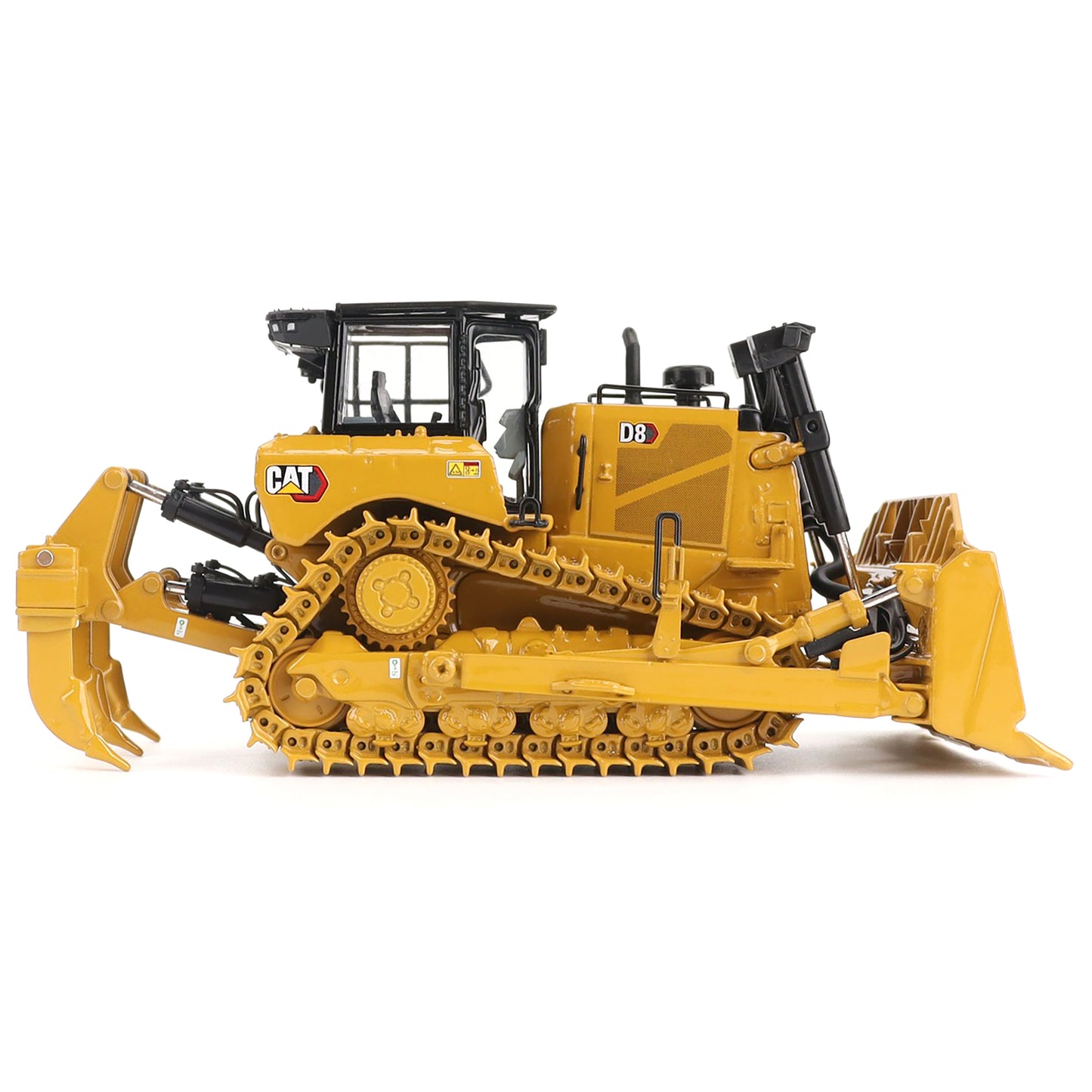 Yellow toy bulldozer with detailed features on a white background