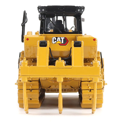 Yellow Caterpillar bulldozer model on a white background