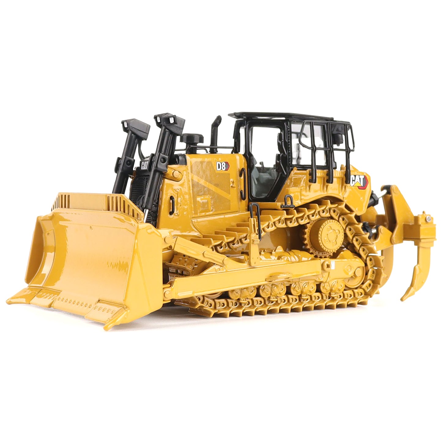 Yellow toy bulldozer on a white background