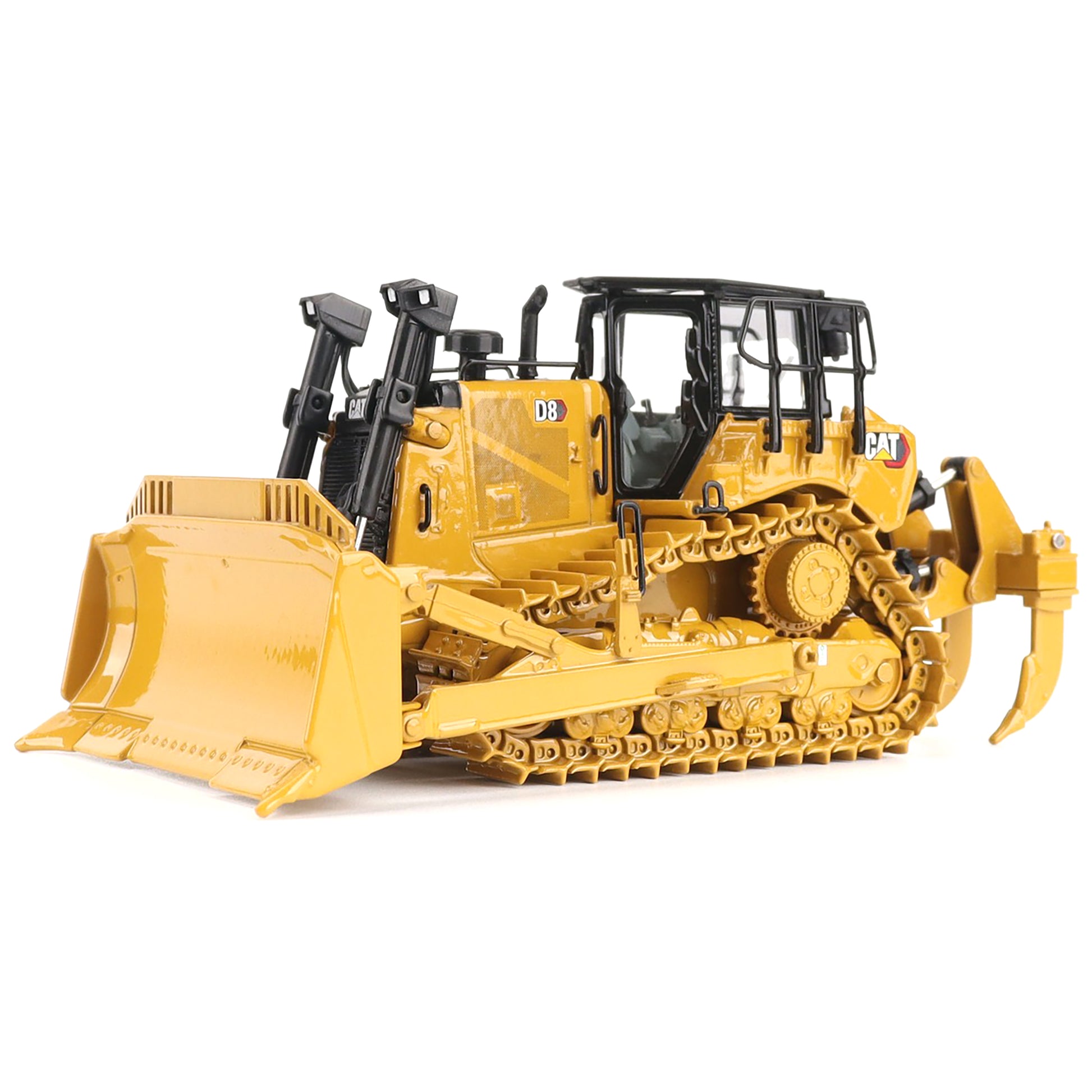 Yellow toy bulldozer on a white background