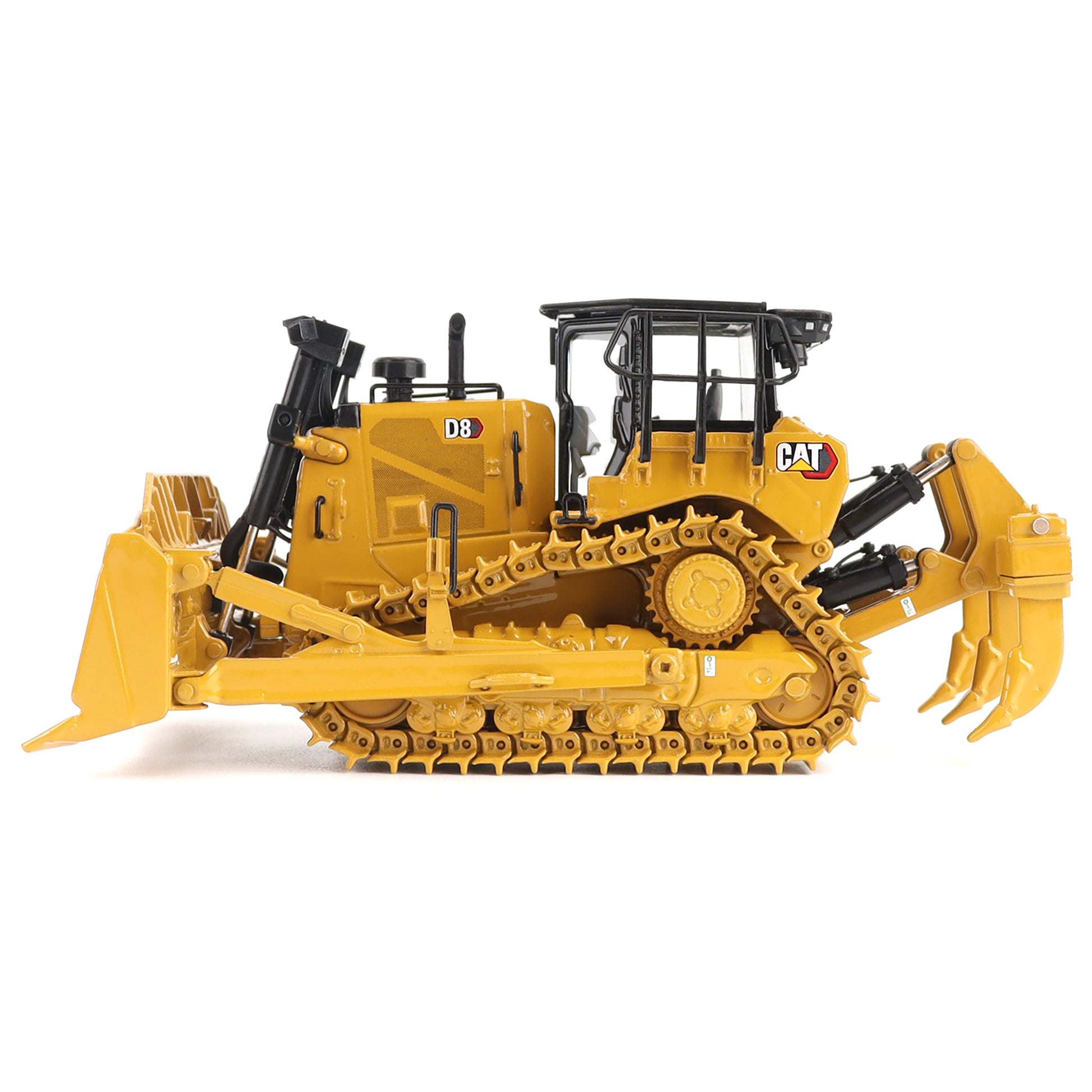 Yellow toy bulldozer with black details on a white background