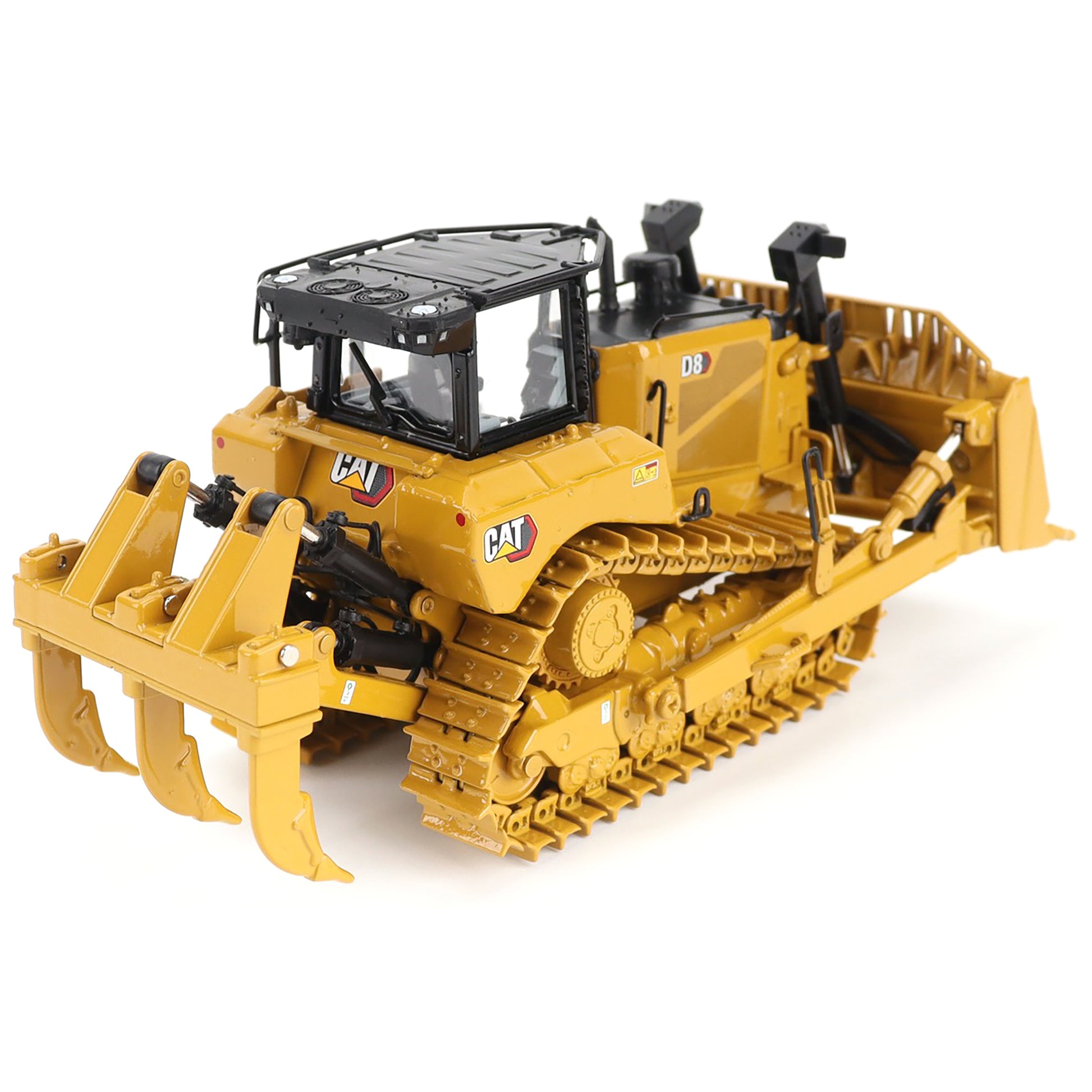Yellow toy bulldozer with detailed features on a white background