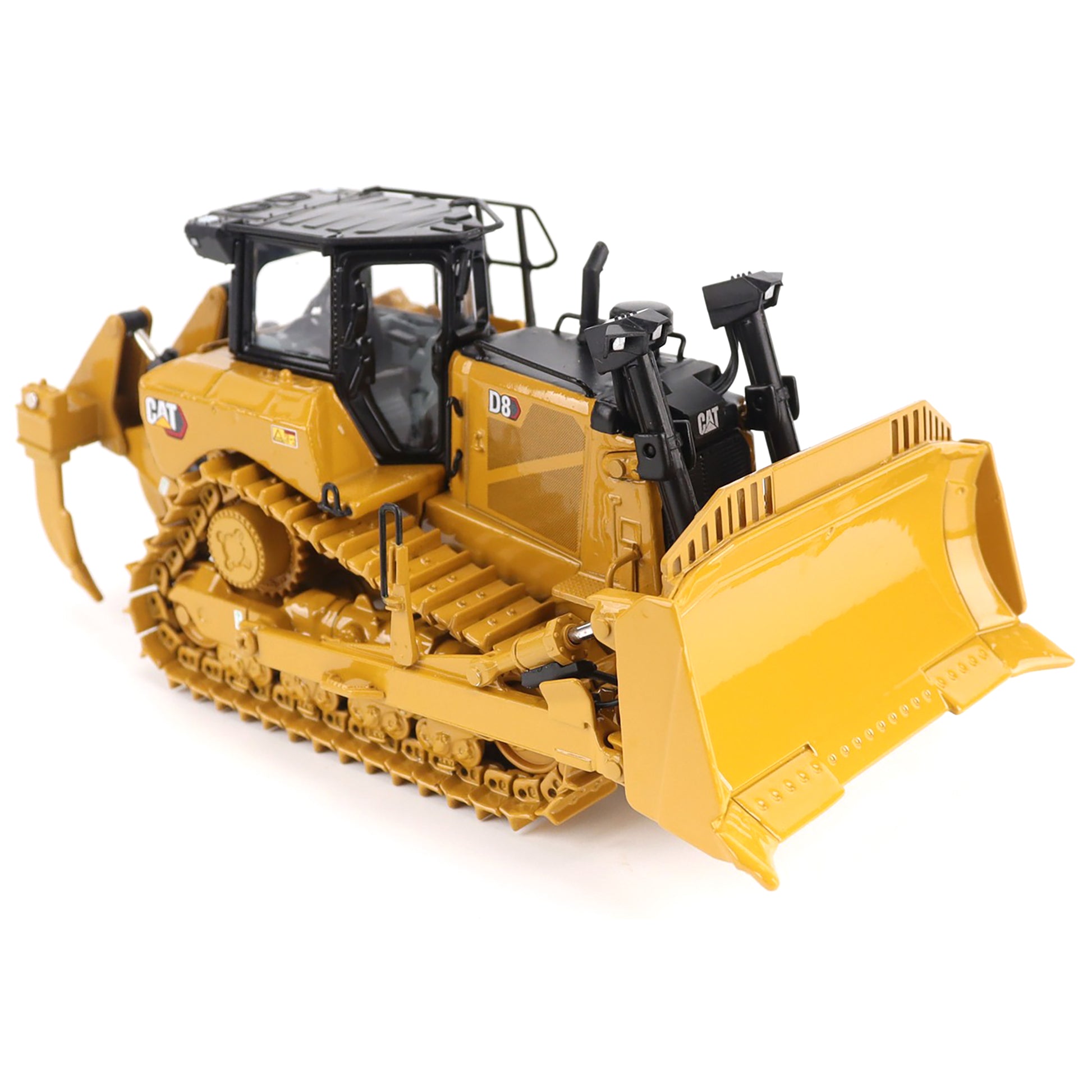 Model of a yellow bulldozer with black accents on a white background