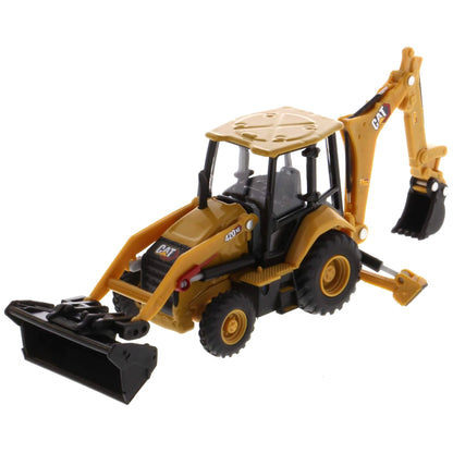 Toy backhoe loader with CAT branding on a white background