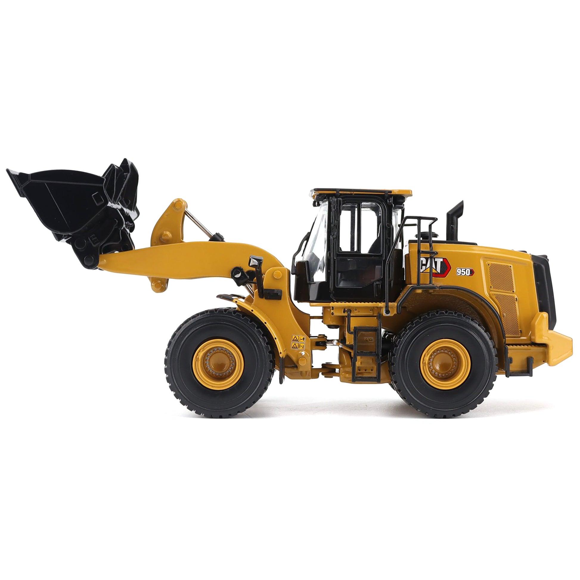 Toy construction vehicle with black bucket on a white background