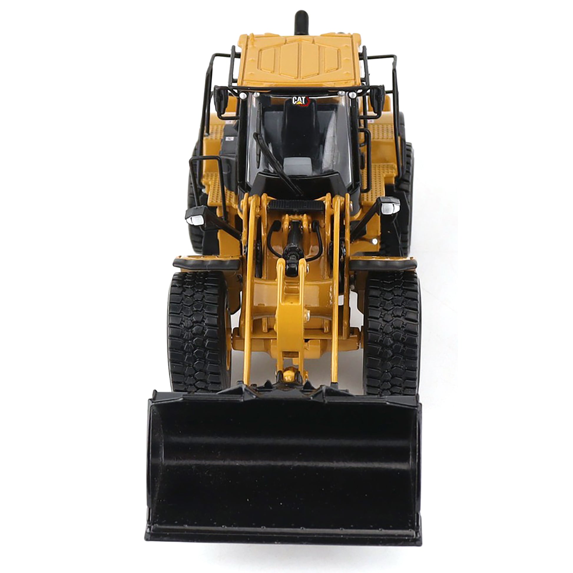 Model of a yellow construction vehicle on a white background