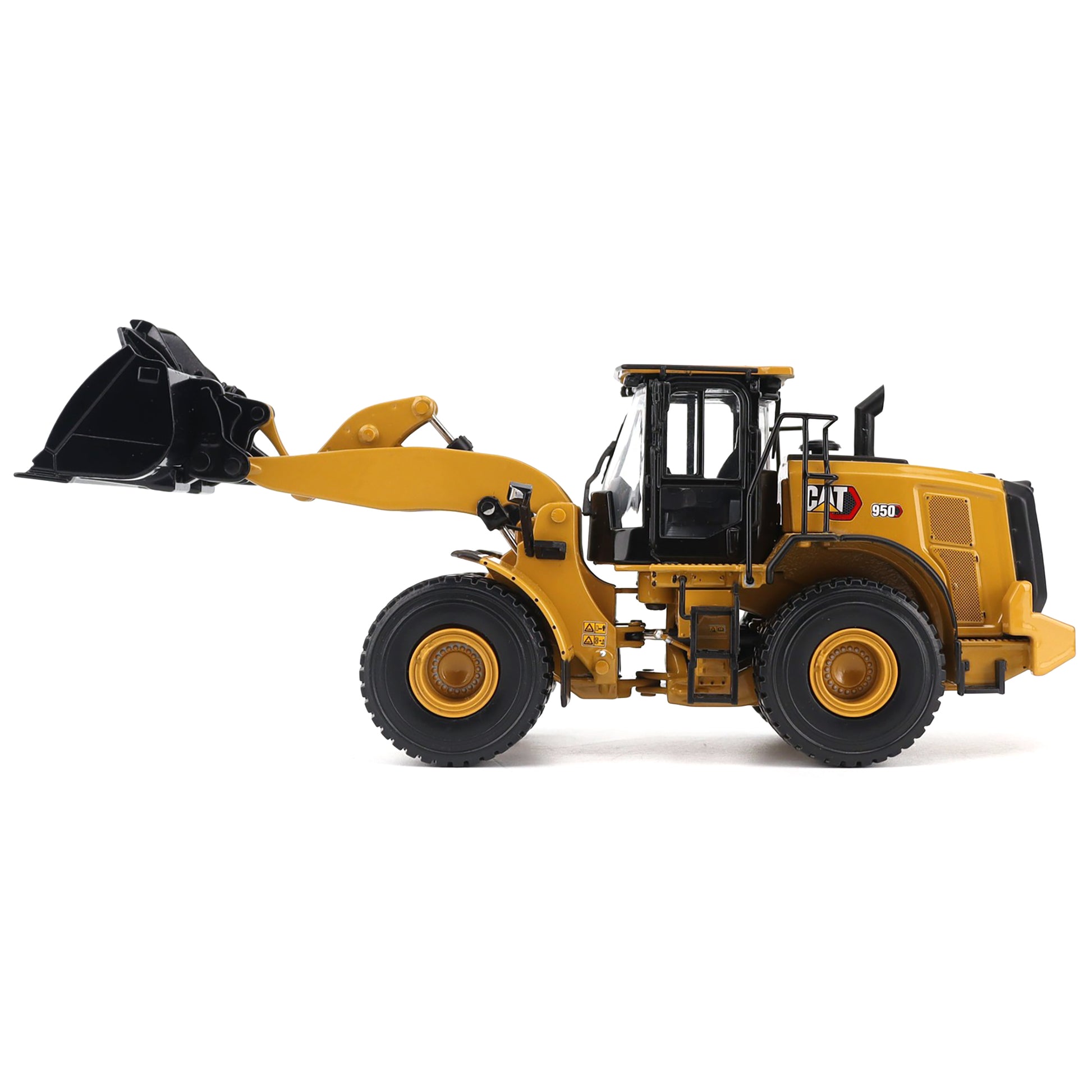Model of a yellow Caterpillar loader on a white background