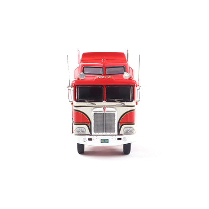 Model of a red and white Kenworth K100 Aerodyne COE truck on a white background