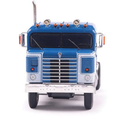Model of a blue 1950 Kenworth 521 Bullnose truck on a white background