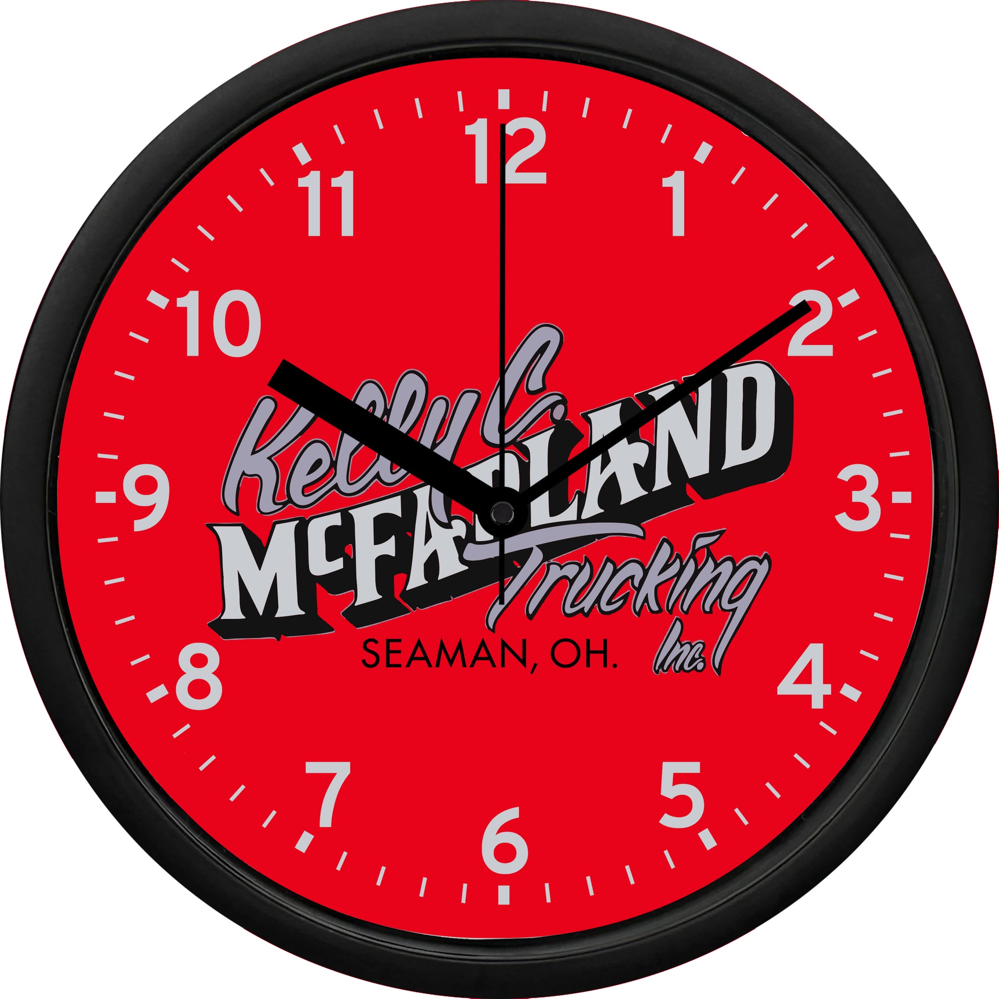 Wall clock with Kelly McFarland Trucking logo on a red background