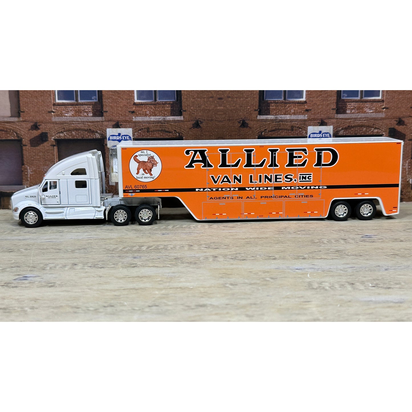 Model truck with 'Allied Van Lines' branding on a plain background