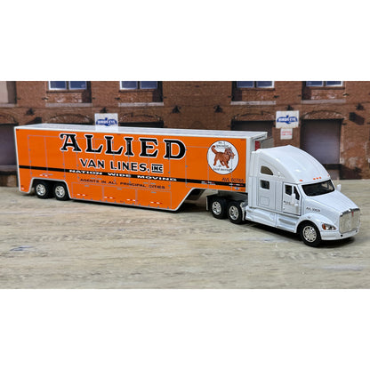 Model truck with 'Allied Van Lines' branding on a wooden floor.