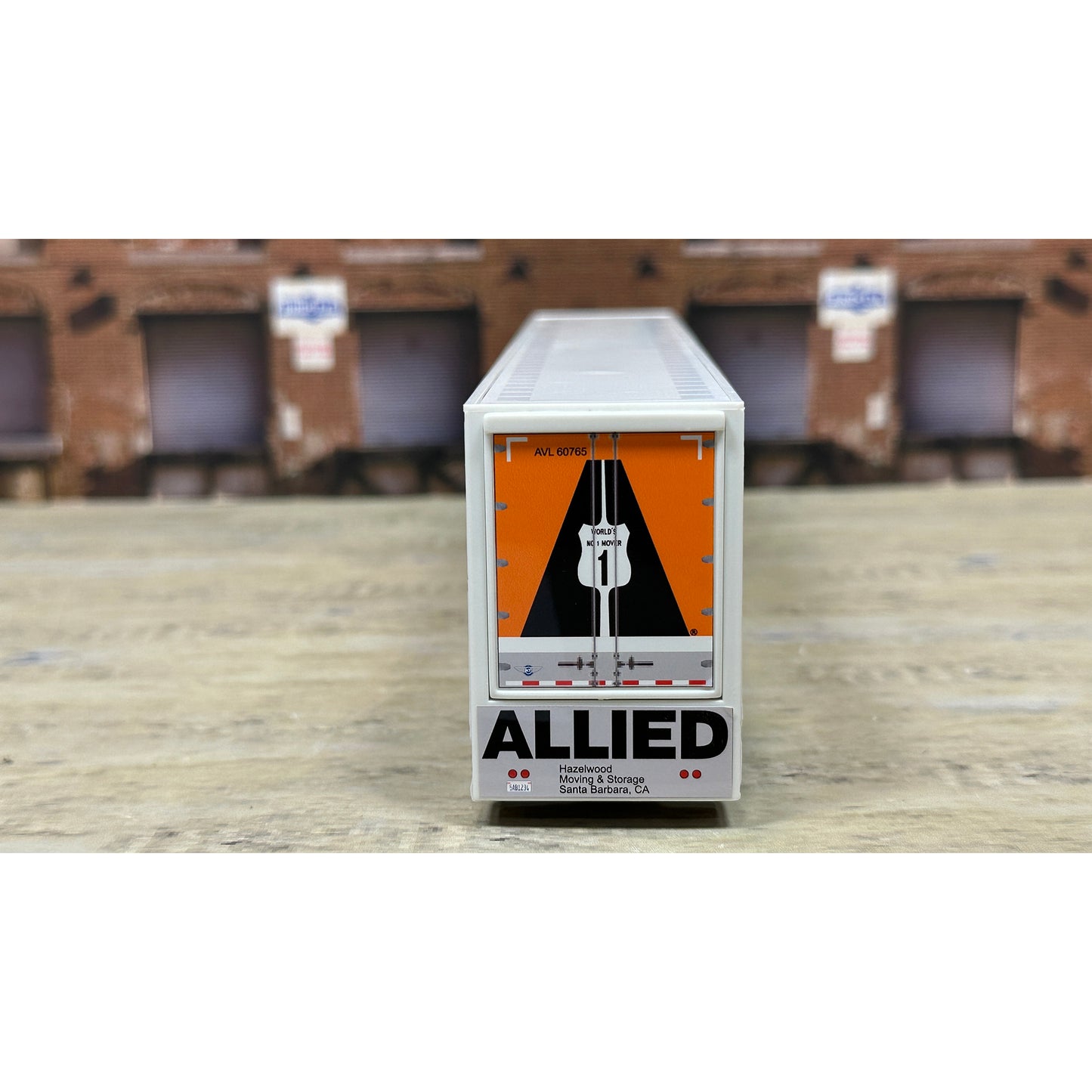 Box with 'Allied' branding on a wooden surface