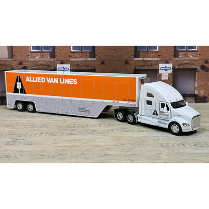 Model truck with 'Allied Van Lines' branding in front of a brick building.
